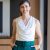 smiling-in-office-businesswoman-wearing-white-blo-2026-03-25-01-19-58-utc-scaled.jpg